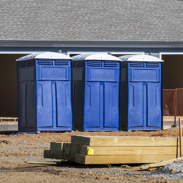 what is the cost difference between standard and deluxe portable toilet rentals in Webster IA